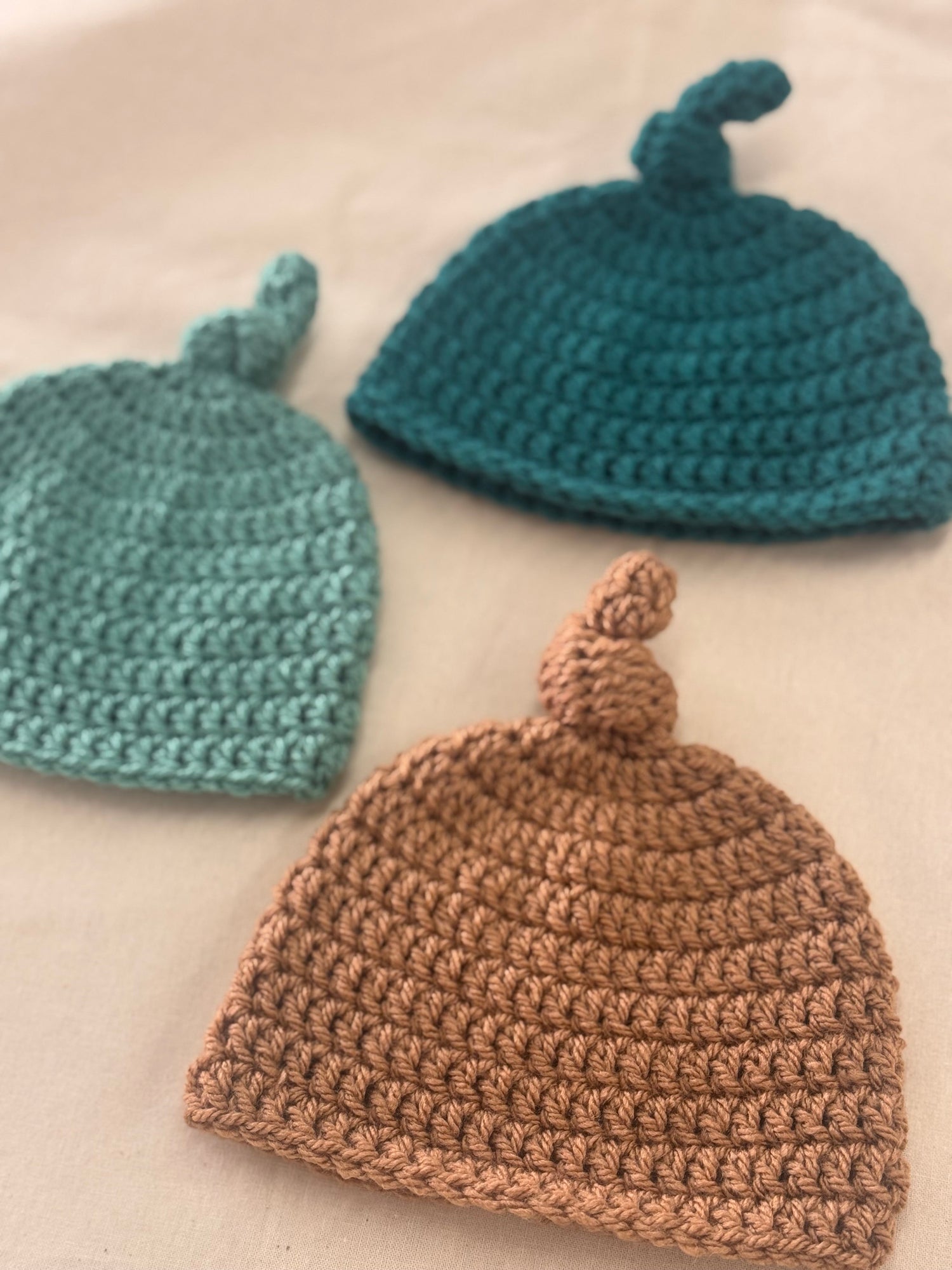 Handmade crochet and cotton baby hats